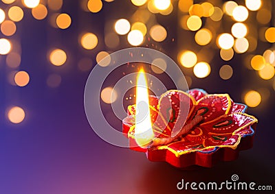 Diya lamp lit during diwali celebration Stock Photo