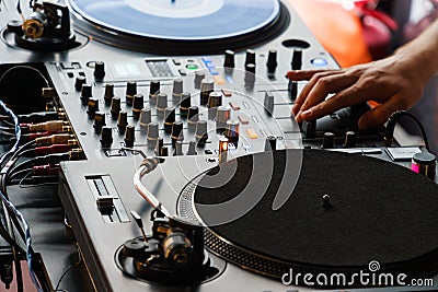 DJ Equipment Deck With Music Track Control And Mixer At Club Party Stock Photo