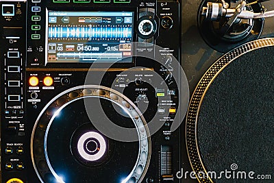 DJ Equipment Deck With Music Track Control And Mixer At Club Party Stock Photo