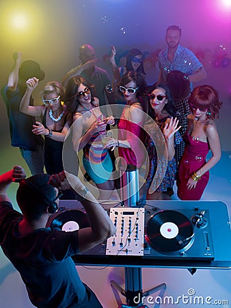Dj Mixing Music At Party With Dancing People Royalty Free Stock Images ...