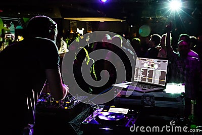 DJ Playing in a Club Editorial Stock Photo