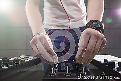 DJ playing music at mixer closeup Stock Photo