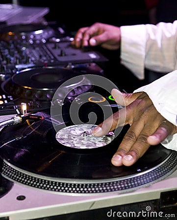 DJ scratching on turntables Stock Photo