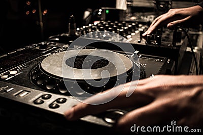 Dj turntables mixing party music in disco Stock Photo