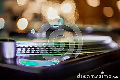 DJ vinyl players in dark nightclub, party in the dance club Editorial Stock Photo