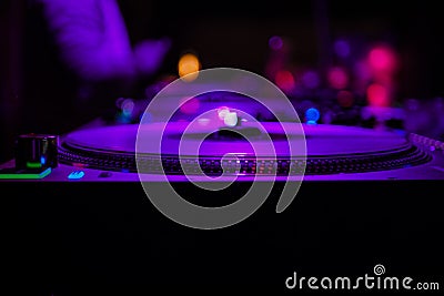 DJ vinyl players in dark nightclub, party in the dance club Editorial Stock Photo