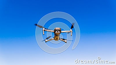 DJI Drone Mavic 2 Pro flying against blue sky Editorial Stock Photo