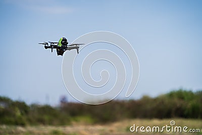 DJI Motion Control, used to steer DJI FPV drones, is held in hand with a blurred background Editorial Stock Photo