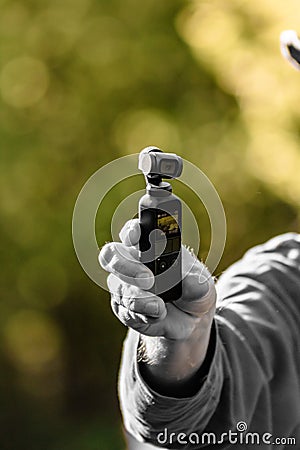 DJI Osmo Pocket being held in hand filming Editorial Stock Photo