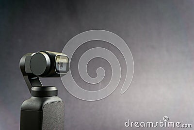 DJI Osmo Pocket stabilized handheld camera close up on black background Editorial Stock Photo