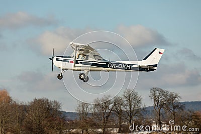 DLOUHA LHOTA CZECH REP - JAN 27 2021. Cessna 150 small sports plane takes off at the airport in Dlouha Lhota Editorial Stock Photo