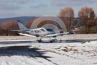 DLOUHA LHOTA CZECH REP - JAN 27 2021. SportCruiser small sports plane. The small SportCruiser takes off on a snowy runway Editorial Stock Photo