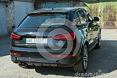Dnepropetrovsk, Ukraine - 06.08.2022: AUDI Q3 in black. Subcompact luxury crossover Audi Q3. Rear view, side view Editorial Stock Photo