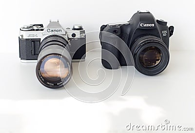 Ð¡oncept of digital and analog reflex Canon cameras Editorial Stock Photo