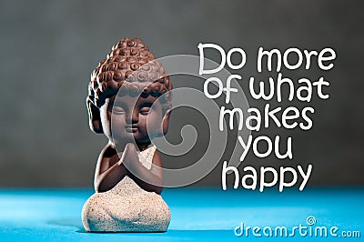 Do more of what makes you happy - inspirational background with white statuette of Buddha. Yoga and meditation concept Stock Photo