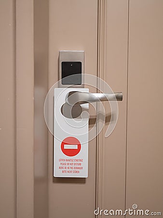 Do not disturb hotel sign on door lock Stock Photo