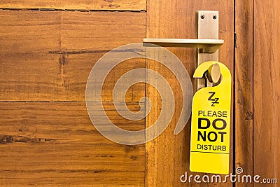 Do not disturb sign on doorknob Stock Photo