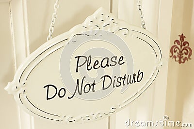 Do Not Disturb Sign Hanging On Door Stock Photo