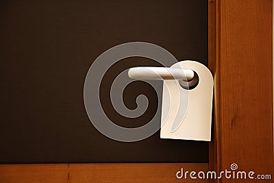 Do not disturb sign on hotel door Stock Photo