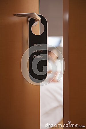 https://thumbs.dreamstime.com/x/do-not-disturb-sign-hotel-door-close-up-31127605.jpg
