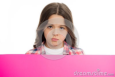 Do not offend children. Girl kid behind pink blank surface copy space. Advertisement concept. Child cute girl looking Stock Photo