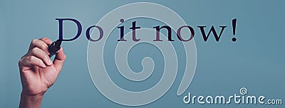 Do it now, Hand writing word for Inspirational phrase, a quote for working mood. Stock Photo