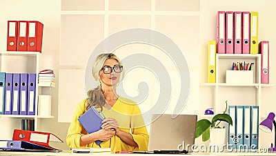 Do It Now. receptionist work on reception. female business leader. woman sit at her desk in office. Business woman Stock Photo