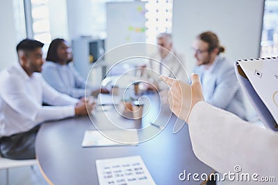 Do you have any questions for me. a businessperson giving a presentation in the boardroom. Stock Photo