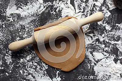 Do it yourself ginger biscuits. Step-by-step cooking recipe. Step 6 Roll out the resulting dough into a thin sheet. Christmas Stock Photo
