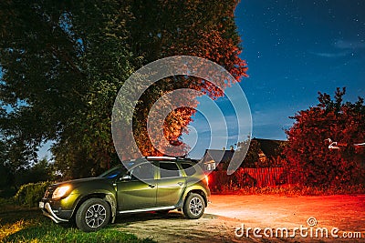 Dobrush, Belarus. Renault Duster Suv Car Parking On Street Under Night Starry Sky Above Renault Duster Suv. Duster Editorial Stock Photo