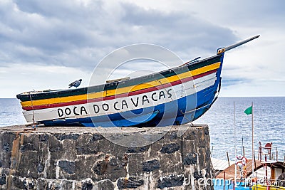 Doca do Cavacas entrance sign in Funchal, Madeira. This small bathing complex consists of natural pools and has direct sea access Editorial Stock Photo