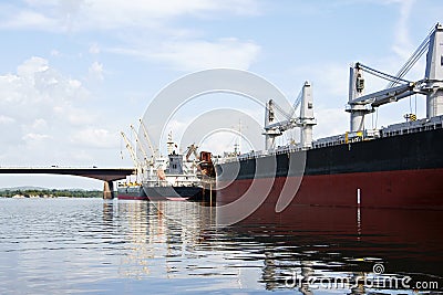 Dock for cargo ships and bridge Editorial Stock Photo