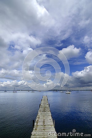 Dock Floating in Blue Water Stock Photo