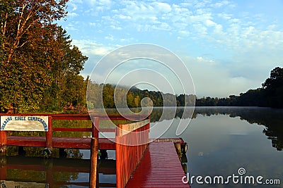 Dock at Soaring Eagle Campground has Beautiful View of Sunrise Editorial Stock Photo