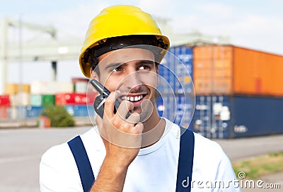 Docker on a seaport talking to a radio device Stock Photo