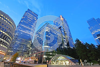 Docklands downtown office skyscrapers night cityscape London UK Stock Photo