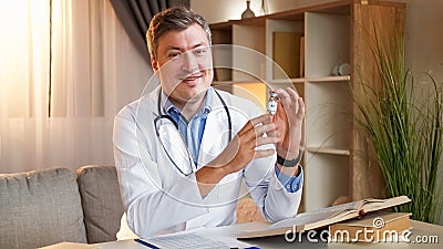 Doctor advice medication man drugs dose office Stock Photo