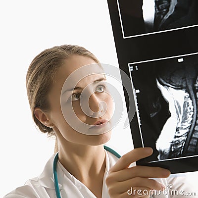 Doctor analyzing x-ray. Stock Photo