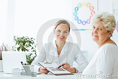 Doctor with balanced diet recommendation Stock Photo