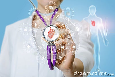 The doctor the cardiologist listens to the heart Stock Photo