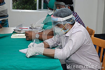 A doctor checking medical patents list Editorial Stock Photo