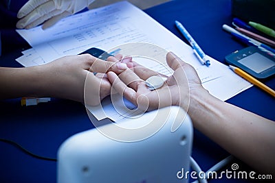 Doctor checking woman patient arterial blood pressure, Health ca Stock Photo