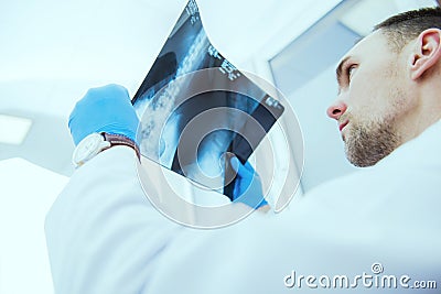 Doctor Checking Xray Results Stock Photo