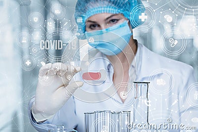 The doctor conducts a coronavirus sample test Stock Photo