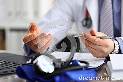 Doctor diagnoses based on tests and health data. Stock Photo