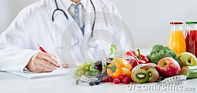 Doctor or dietitian writing a healthy food recipe Stock Photo