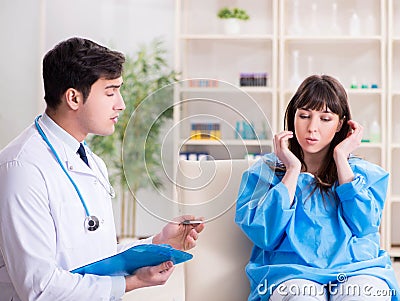 Doctor discussing blood transfusion with patient Stock Photo