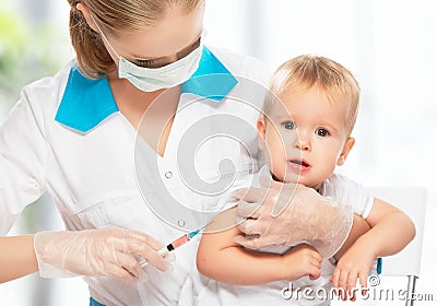 Doctor does injection child vaccination baby Stock Photo