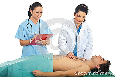 Doctor examine asleep patient Stock Photo