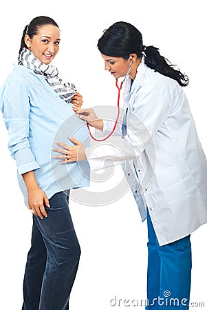 Doctor examine pregnant woman belly Stock Photo